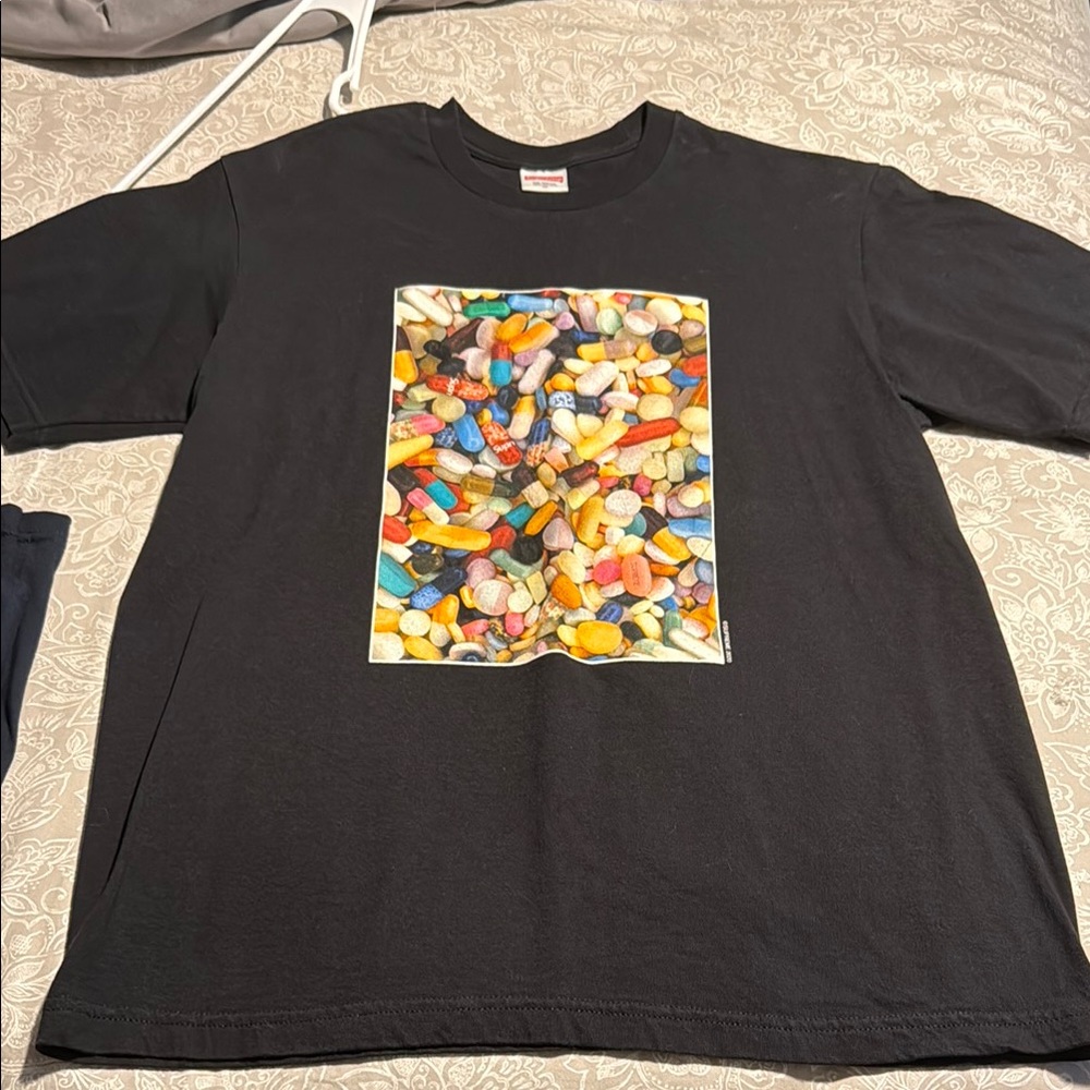 Supreme Black Tee pills tee